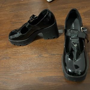 Shiny black platform Mary Janes shoes